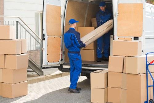 Local movers working in a Lewisham residential street