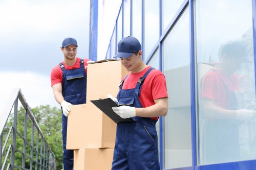 Professional house removalists loading furniture in Lewisham