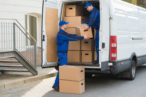Man With A Van Lewisham pricing page with moving van and boxed household items