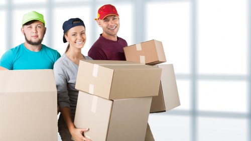 Mover wearing PPE during a safe house move