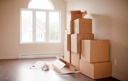 Organised storage space in Lewisham with labelled boxes and furniture