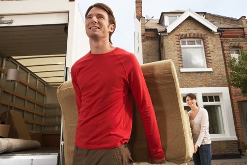 Unpacking boxes and organizing a new home in Lewisham