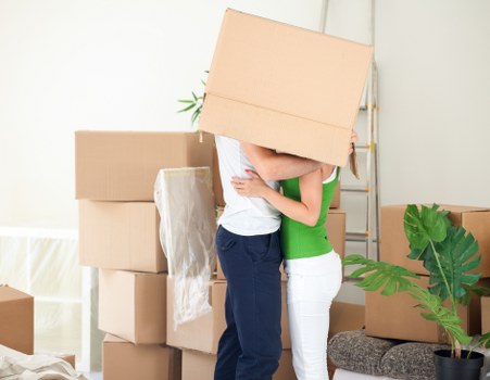 Careful loading of household items for flat removals in Lewisham