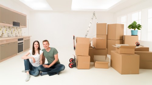 Furniture and boxes being loaded into a removal van in Lewisham