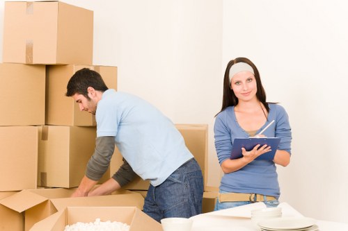 Office relocation setup with boxes and desks for Lewisham removals