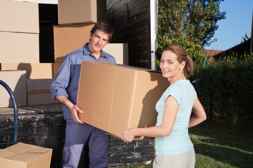 Professional moving team following safety procedures